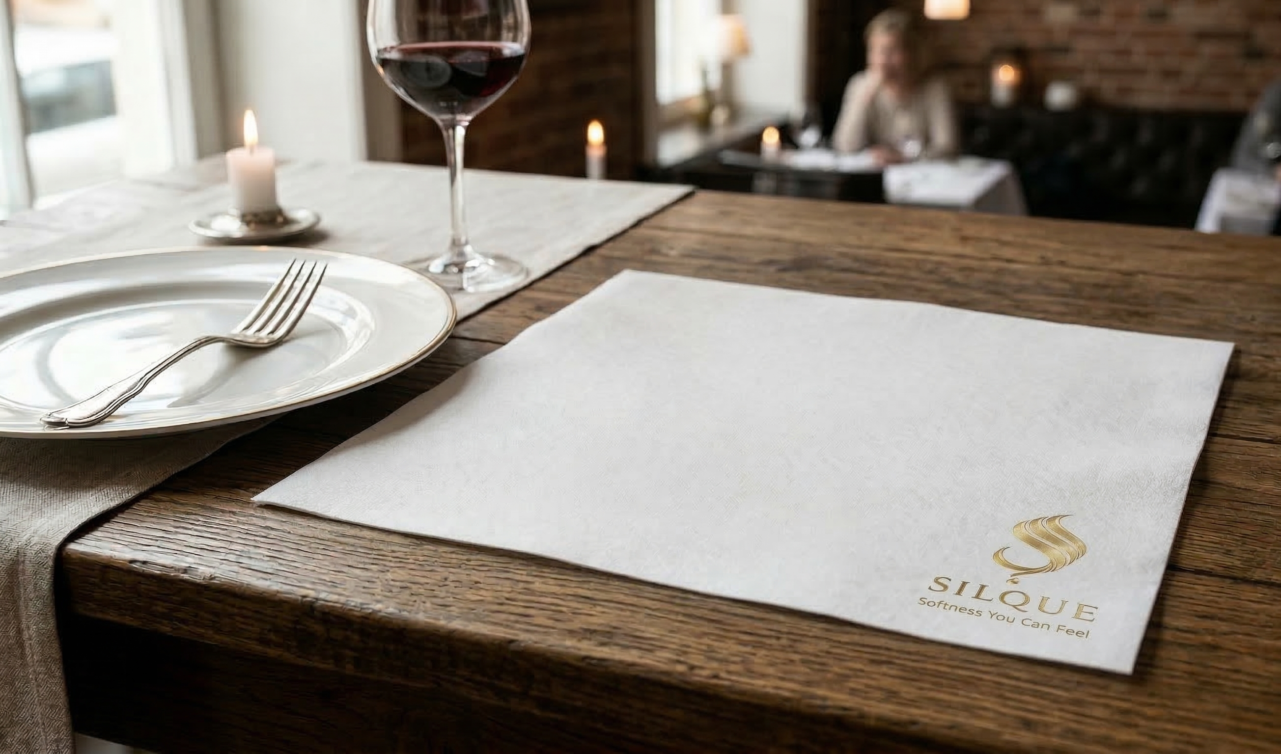 40x40 airlaid dinner napkin on a dining table